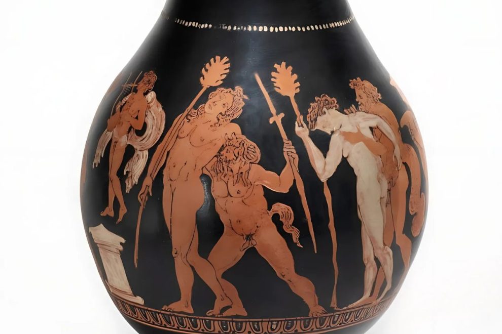 A tall black vase with terracotta figures in a classic Ancient Greek style